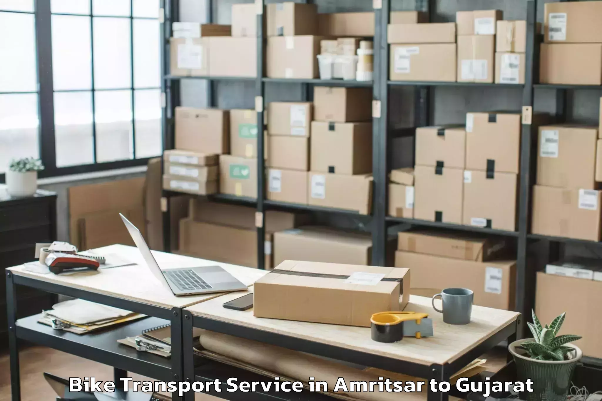 Leading Amritsar to Jamnagar Bike Transport Provider